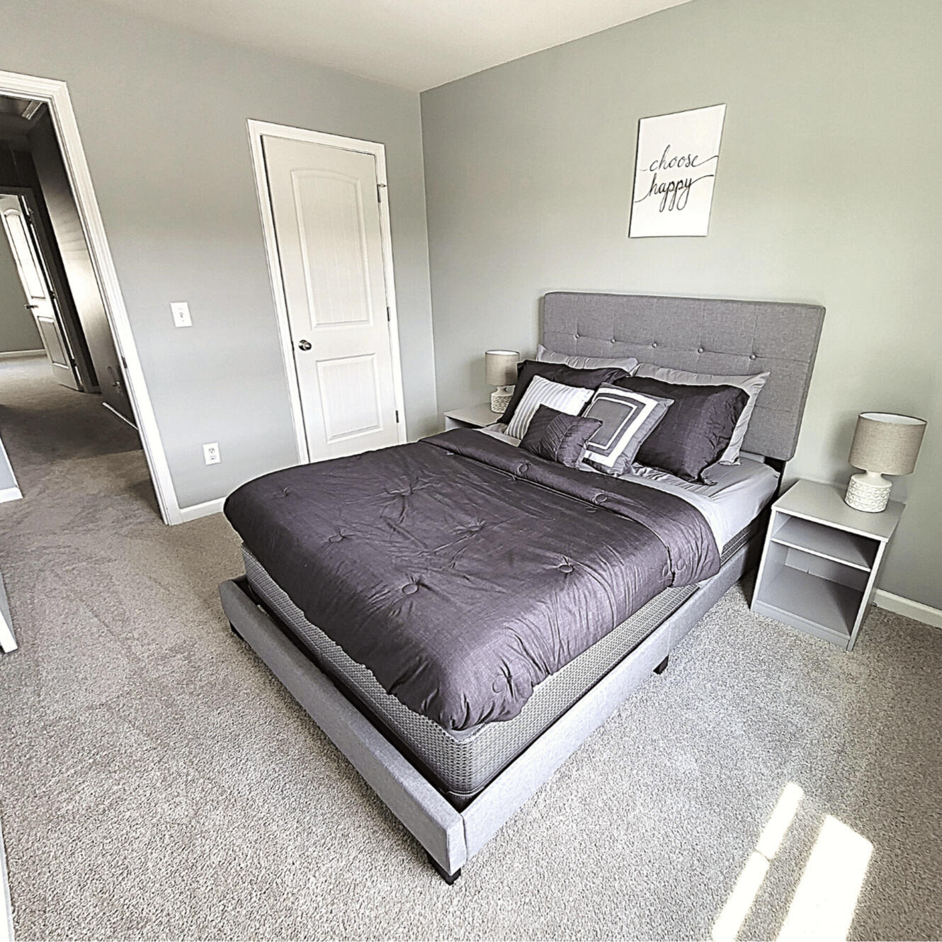 Guest bedroom with full bed in the furnished Wake Forest rental