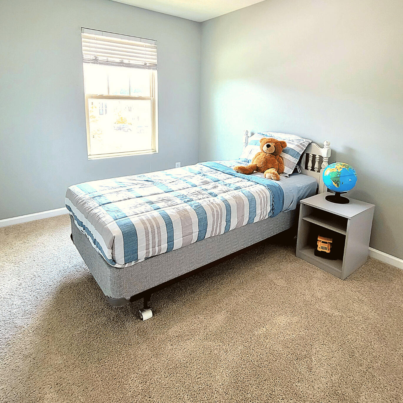 Children’s bedroom with twin bed in the Wake Forest furnished rental